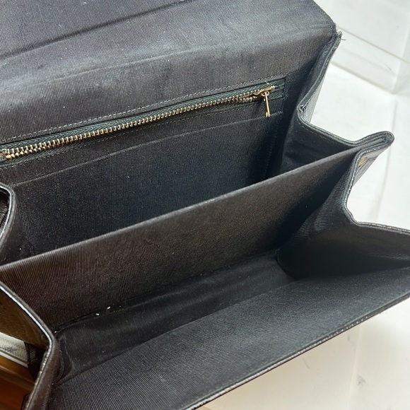 The croc-embossed Kelly Small handbag features a top-handle  Vintage Structured Croc Embossed Double Handle Flap Handbag
